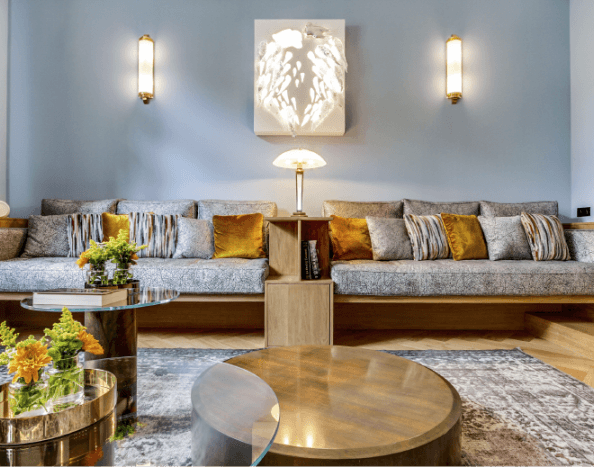 by Parisians Interiors Living Room with blue walls
